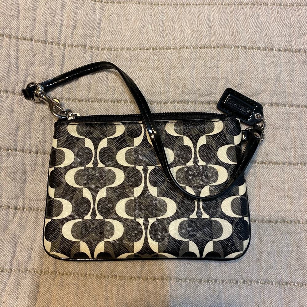 Black and white coach wristlet